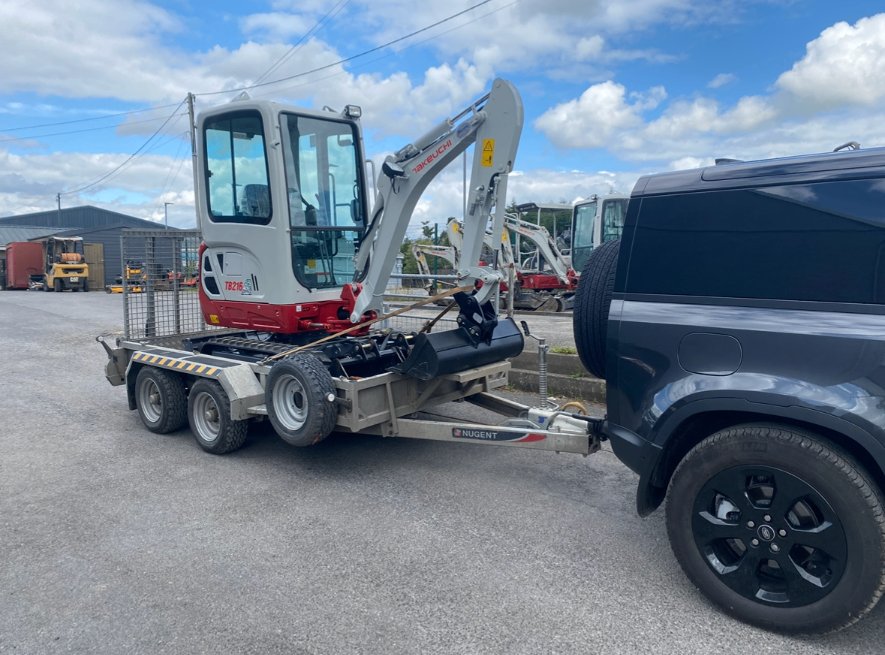 Takeuchi TB216 mini digger on our trailer