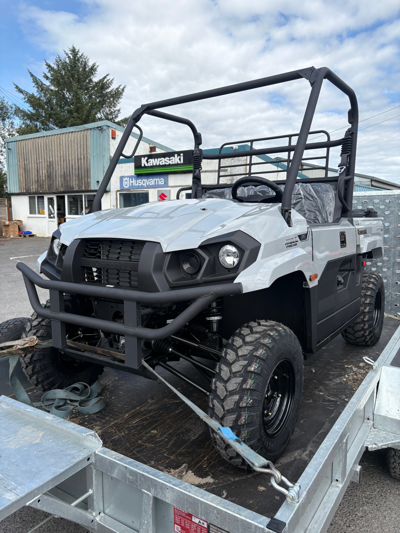 New Kawasaki Mule PRO-MX on our trailer outside the showroom
