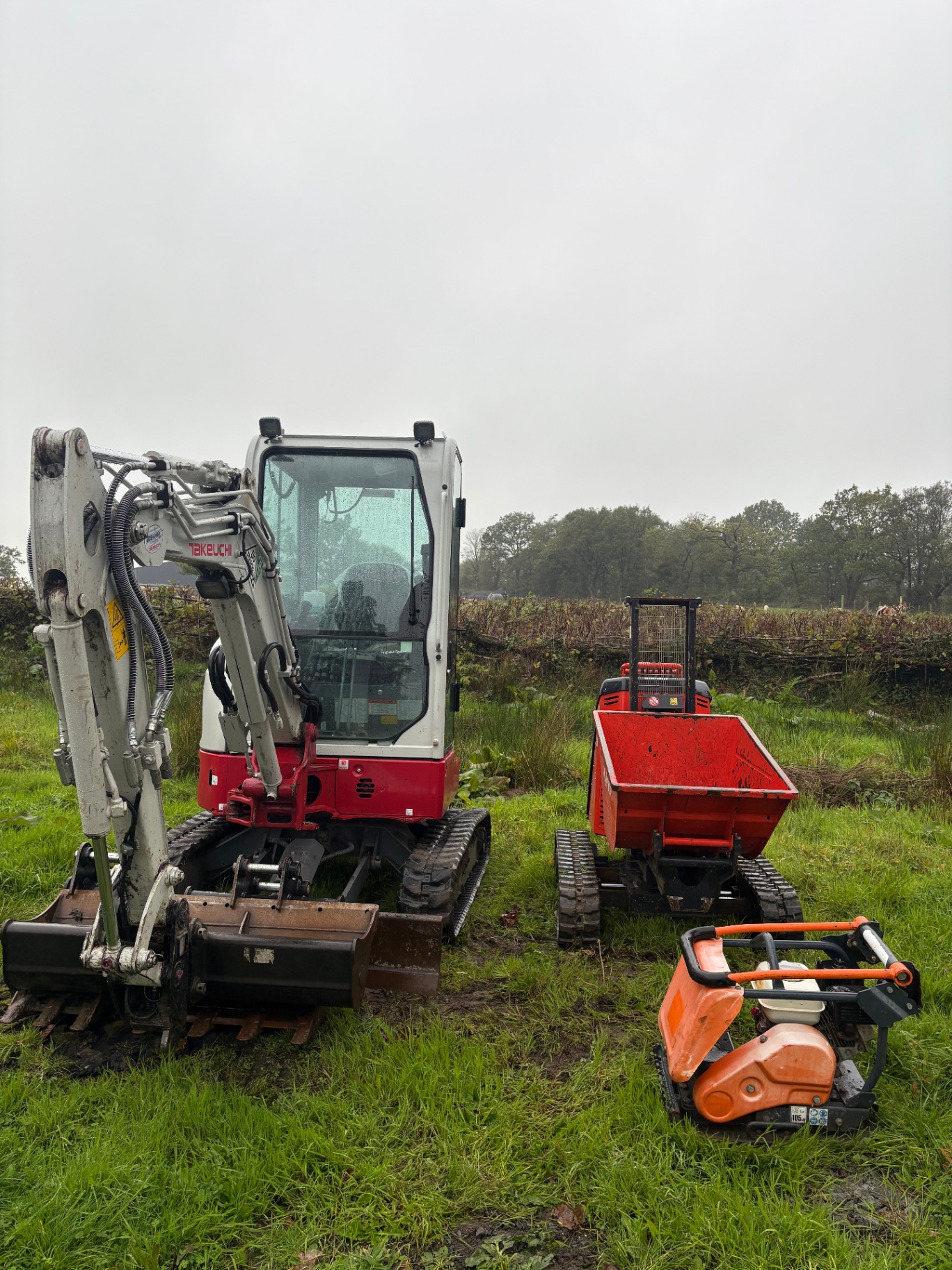 Takeuchi digger, Kubota tracked dumper and wacker plate out on a job